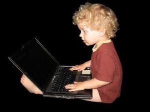 little boy laptop 300x225 - The Expanding Role of Digital Literacy in the Traditional Classroom